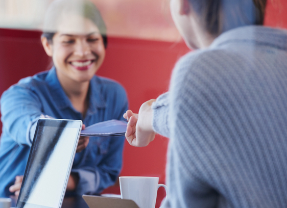 two people engaging in a transaction