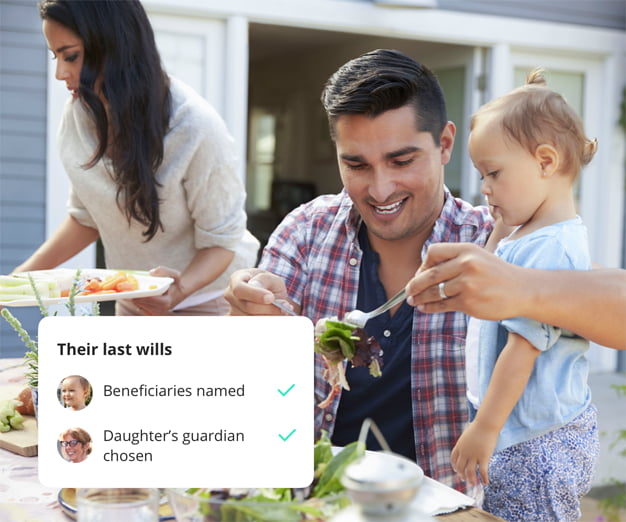 Husband and wife sitting down to lunch with baby daughter